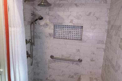 Example of a mid-sized classic master beige tile and ceramic tile ceramic tile, beige floor and single-sink bathroom design in Grand Rapids with furniture-like cabinets, dark wood cabinets, orange walls, an undermount sink, granite countertops, white countertops and a freestanding vanity