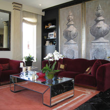 front room -red couch/charcoal walls