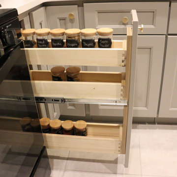 Kitchen Remodel. Light grey cabinets with white quartz Calacatta Laza countertop