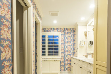 Inspiration for a mid-sized contemporary master green tile and stone tile marble floor alcove shower remodel in Minneapolis with recessed-panel cabinets, white cabinets, a two-piece toilet, blue walls, an integrated sink and quartz countertops