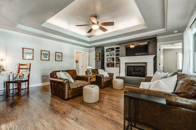 Living room - farmhouse living room idea in Dallas