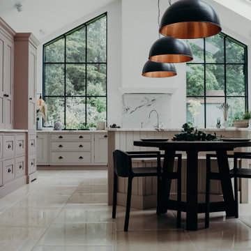 Olive - Kitchen and Island overview. Crittall windows, marble island and limesto