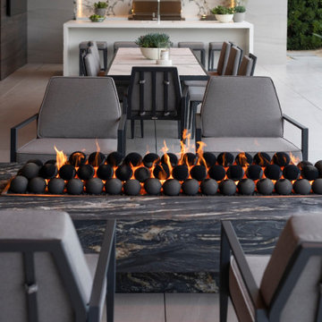 Bighorn Palm Desert luxury home terrace modern firepit and outdoor kitchen