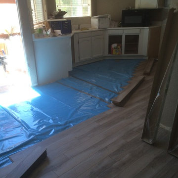 Delaware Bay Driftwood 10 mm laminate with attached underlayment