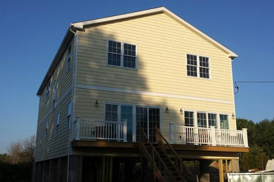 Inspiration for a large coastal home design remodel in New York