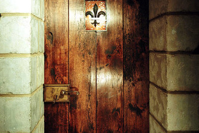 Example of an eclectic wine cellar design in New York