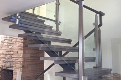 Staircase - contemporary staircase idea in Orange County