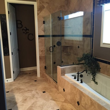 Custom Travertine Bathroom with Black Galaxy Accents
