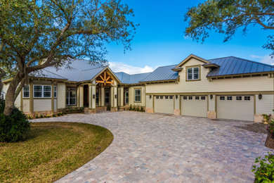 Elegant one-story concrete fiberboard house exterior photo in Jacksonville with a metal roof