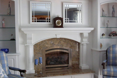 Living room - mid-sized traditional dark wood floor living room idea in Philadelphia with a standard fireplace and a stone fireplace
