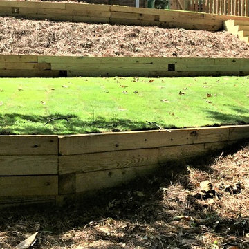 3 Tier PT Timber Walls, PT Timber Steps, Paver Patio, Irrigation, Sod, Drainage