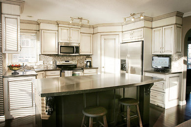Example of a mid-sized classic kitchen design in Calgary