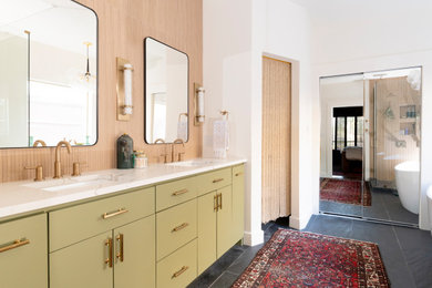 Mid-sized mid-century modern master slate floor, gray floor and double-sink bathroom photo in Dallas with flat-panel cabinets, green cabinets, a drop-in sink, quartz countertops, white countertops, a niche and a built-in vanity