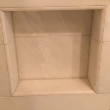 BATHROOM - Calcutta Gold Marble Shower / Gray Penny Tile Floor