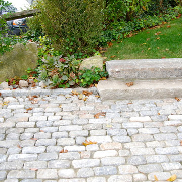 Cobblestone Driveway & Natural Outdoor Living Space