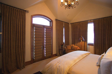 Bedroom - mid-sized traditional master carpeted and beige floor bedroom idea in San Francisco with beige walls