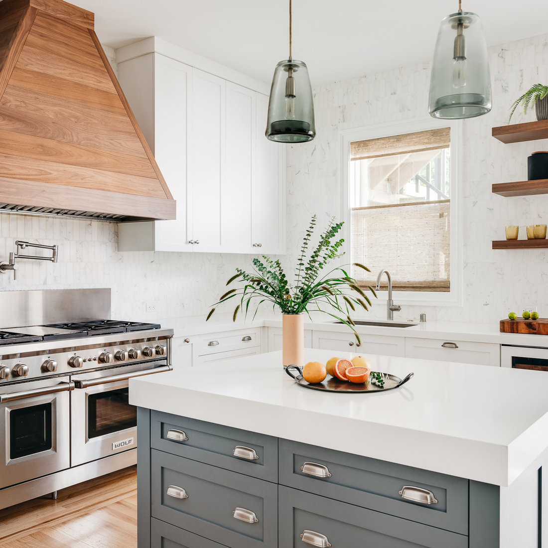 Bright Transitional Kitchen with Carrara Marble and Walnut Accents