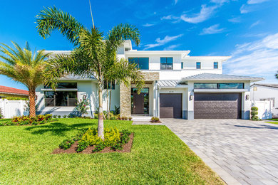 Contemporary two-story exterior home idea in Miami