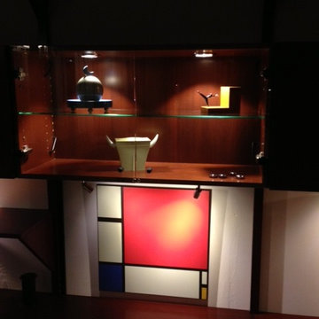 Moderini glass cabinet with l.e.d. lighting.
