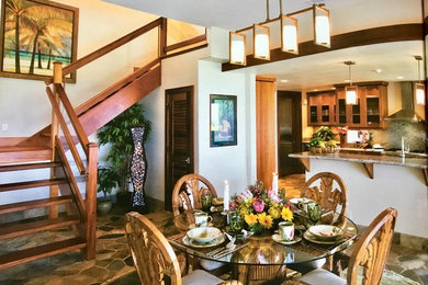 Large transitional slate floor and multicolored floor kitchen/dining room combo photo in Hawaii with white walls