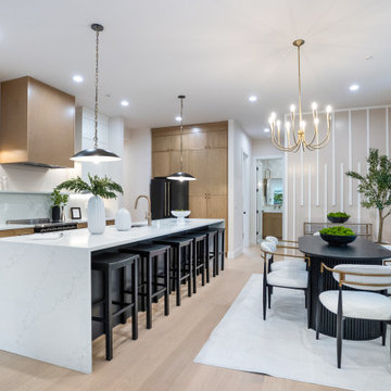 Kitchen and Dining Overview: Waterfall Island, Oak Hood and Chandelier – Bothell