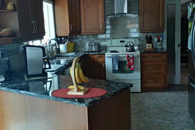 Transitional kitchen photo in Vancouver