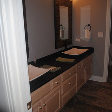 Dual vessel bowl vanity in Safari themed bathroom