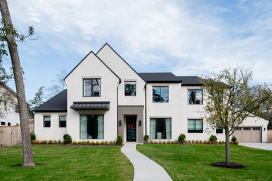 Huge transitional two-story house exterior idea in Houston