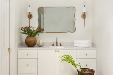 Inspiration for a large transitional master single-sink tub/shower combo remodel in San Francisco with shaker cabinets, white cabinets and a built-in vanity