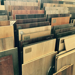 We have an entire wall of LM Flooring products. - Hardwood Flooring