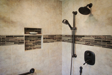 Design ideas for a large traditional master bathroom in Seattle with a corner shower, flat-panel cabinets, dark wood cabinets, a two-piece toilet, beige tile, brown tile, matchstick tile, beige walls, ceramic floors, a drop-in sink and granite benchtops.