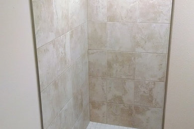 Ceramic tile doorless shower photo in Other