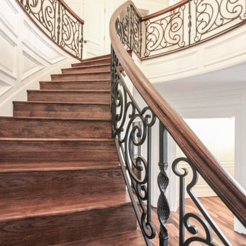 Project #74 | Circular Staircase with Hand-Forged Metal Panels