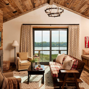Weathered Antique Paneling and Antique Skip Oak Flooring in Cozy Farmhouse Livin