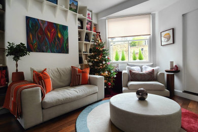 This is an example of a small contemporary open plan living room in London.