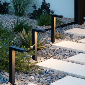 Glowing path lights and agave garden