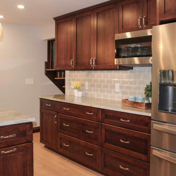 A neutral backsplash creates the perfect backdrop to highlight the beautiful cab