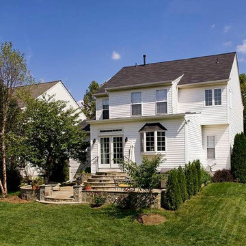 Large Kitchen Addition Opens to Patio for Enhanced Family Living