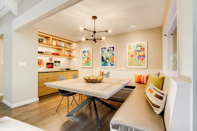 This is an example of a contemporary dining room in Seattle.