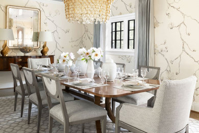 Inspiration for a timeless medium tone wood floor, brown floor and wallpaper dining room remodel in DC Metro with beige walls