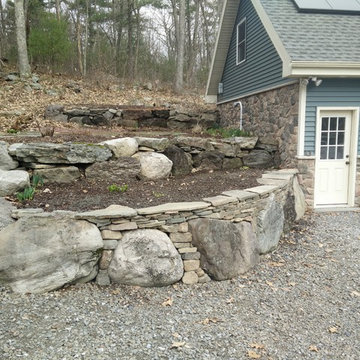 Semi-Dry laid retaining wall on exisiting boulders