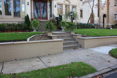 Inspiration for a huge contemporary front yard stone landscaping in Other.