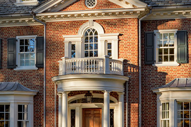 Single front door - traditional single front door idea in New York with a medium wood front door