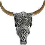 Renwil - Oceane Wall Accent, Raw Polish and Natural Wood - An iconic totem of Southwestern style, this traditional cow skull wall art statue gets an stylized update with an ornamental design. The decorative filigree pattern is cast from aluminum in the shape of the cattle head, then affixed with natural mango wood horns to represent the animal's outstretched antlers. Mounted above fireplace mantle or doorframe, the decorative animal art piece is a welcoming addition to rustic interiors.
