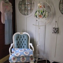 chandelier hanging from bird cage stand