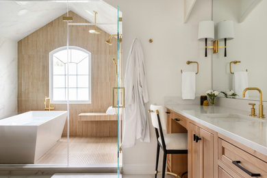 Bathroom - transitional master beige tile white floor bathroom idea in DC Metro with shaker cabinets, light wood cabinets, white walls, an undermount sink, a hinged shower door, white countertops and a built-in vanity
