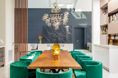 Example of a large trendy marble floor and white floor kitchen/dining room combo design in Miami with white walls and no fireplace