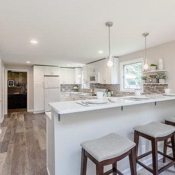 White Cabinets w/ Bar Height Peninsula