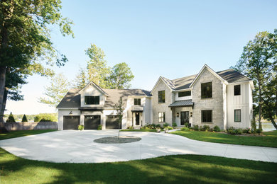 Large beach style home design photo in Grand Rapids