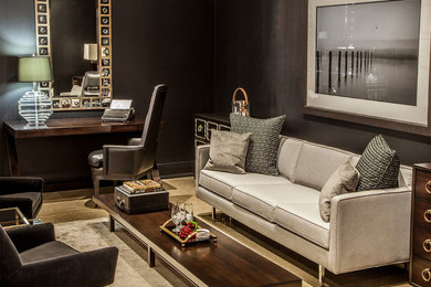 Example of a mid-sized trendy formal and enclosed concrete floor and beige floor living room design in Toronto with beige walls, no fireplace and no tv